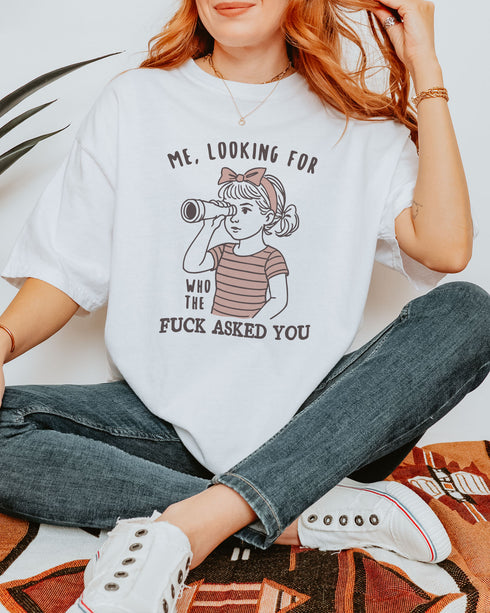 Model wearing white color shirt with 'Me, Looking For Who The Fuck Asked You' graphic design